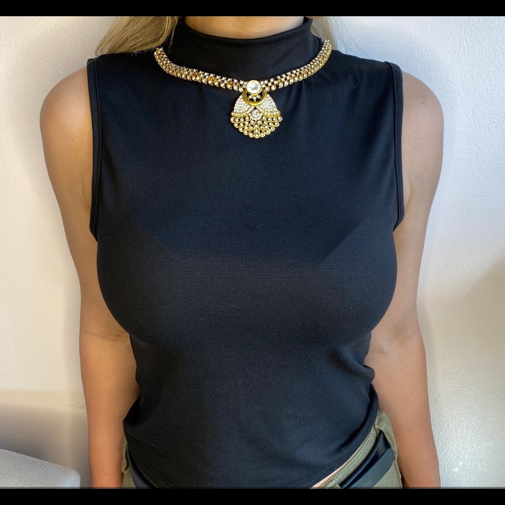 Black blouse embroidery with Indian jewelry